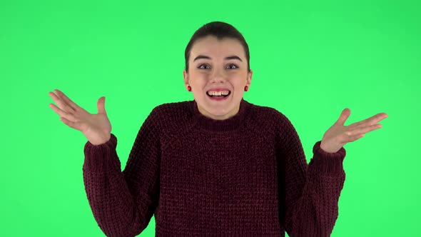 Very Surprised Girl with Shocked Wow Face Expression Rejoices. Green Screen