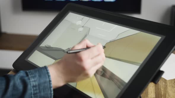 A Professional Architect Draws a Room Sketch on a Digital Tablet