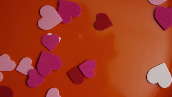 Rotating stock footage shot of Valentines decorations and candies - VALENTINES 0094