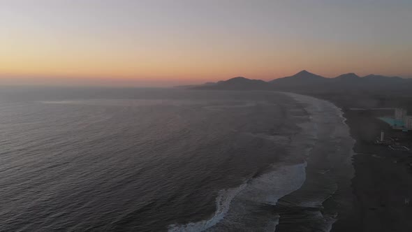 Orange Sunset Pacific Ocean (La Serena, Chile) aerial view, drone footage