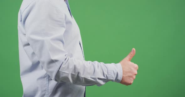 Side view of a man counting his fingers