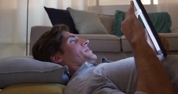 Caucasian man using a digital tablet