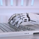Robots hands typing on a laptop keyboard - VideoHive Item for Sale