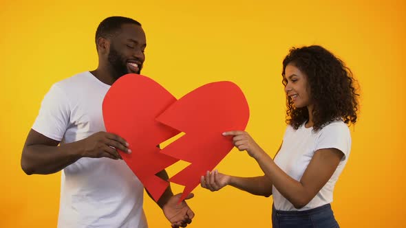 Multiracial Pair Connecting Paper Heart, Reconciliation After Quarrel, Relations