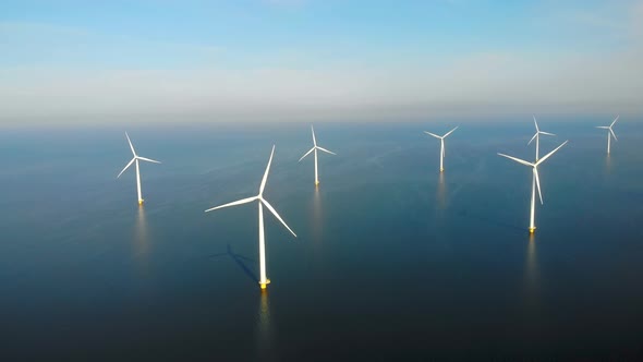 Windmill Park in the Ocean Drone Aerial View of Windmill Turbines Generating Green Energy Electric