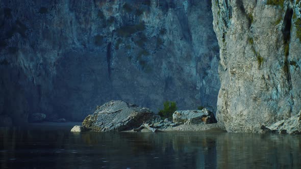 Rocky Cliffs in the Ocean at Sunny Day