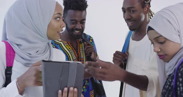 African Students in Traditional Clothes Planing and Preparing for Activity at University