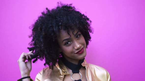 Young woman with cury hair and freckles