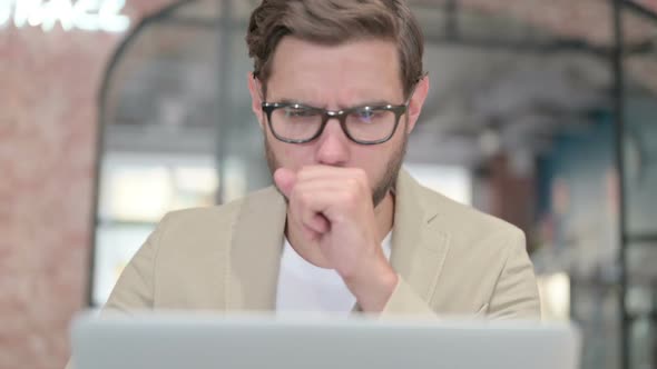 Close Up of Man with Laptop Having Coughing