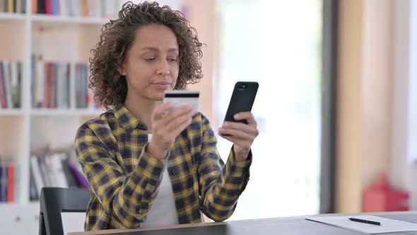 Online Shopping Payment on Smartphone By Mixed Race Woman