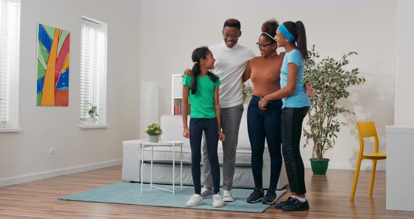 The Happy Family is Spending Time in Newly Rented Purchased Apartment They are Standing in Middle of