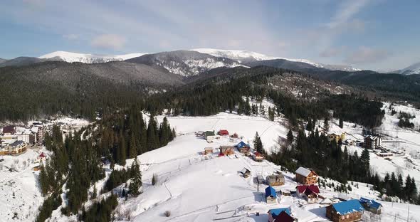 Aerial View of the Village Menzberg in Winter Wtih Mount Napf in the Background in Switzerland