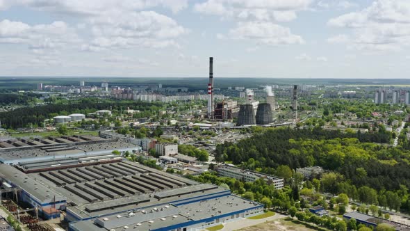 Aerial View Panorama of Industrial Area of City Drone Flies Over Power Plant on Sunny Day