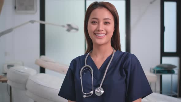 Portrait of beauty clinic doctor turn back then smiling and look at camera with happiness