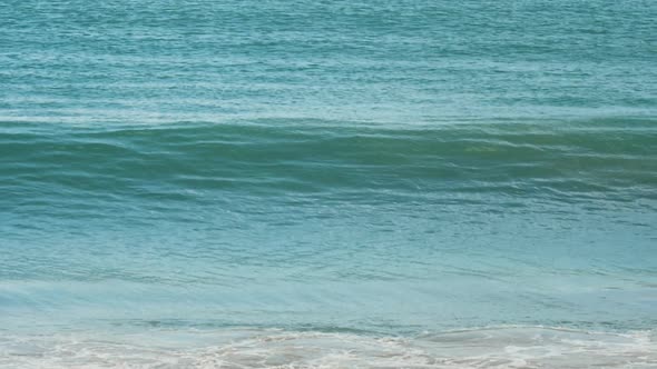 Azure Waves Rolled Shore of Mai Khao Beach