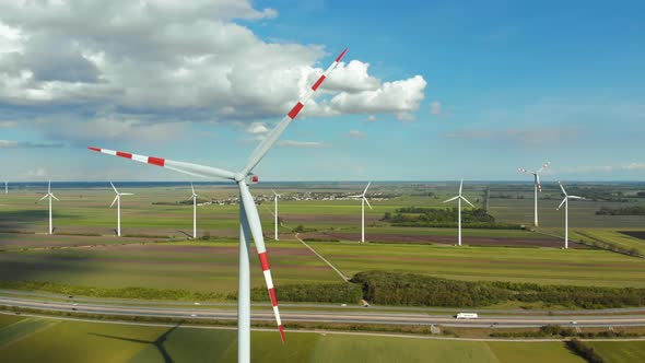 Aerial View of Wind Turbines Farm in Field. Austria. Drone View on Energy Production