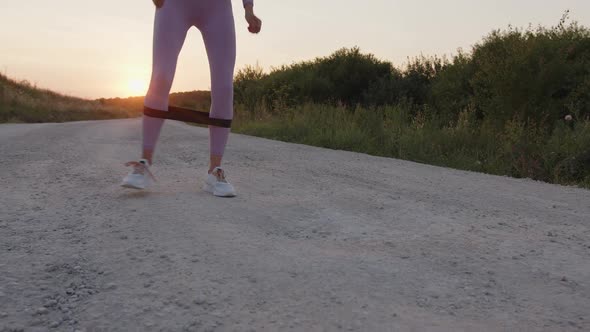 View of Gilr's Legs with Black Elastic Band