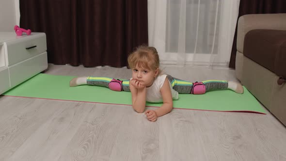 Child Kid Training Gymnastics Stretching Twine at Home Children Girl Making Sport Workout Exercises