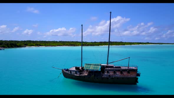 Aerial seascape of beautiful coast beach vacation by shallow sea with white sandy background of a da