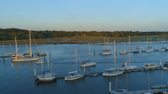 Aerial View of Yachts Moored in an Estuary at Sunset