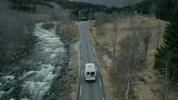 Cinematic Drone Shot of Camper Van on Forest Road