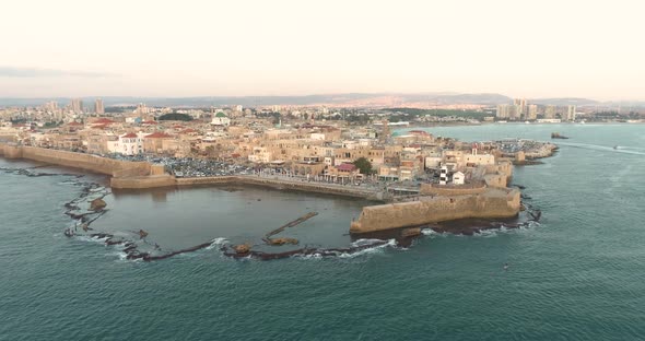 Aerial view of natural water pool along the coast in Acre Old town, Israel.