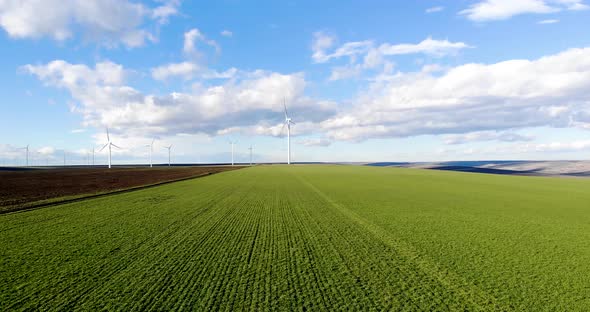 Low drone flight towards wind turbines