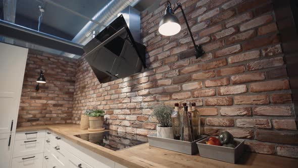 Kitchen showroom bench and stove gimbal shot
