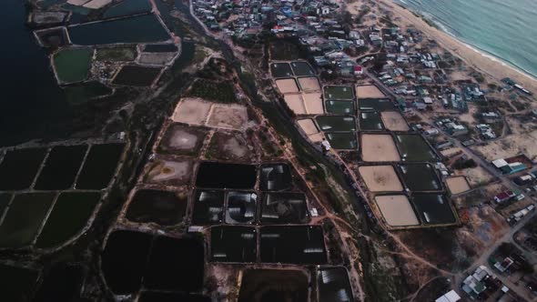 A steady flight over Son hai town in Southern Vietnam. A place is popular for shrimp farming