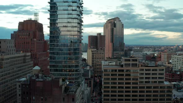 Descending Aerial Footage of High Rise Buildings in City