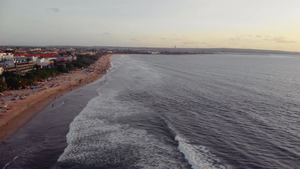 Flight at Sunset Overlooking the Indian Ocean in Bali Indonesia