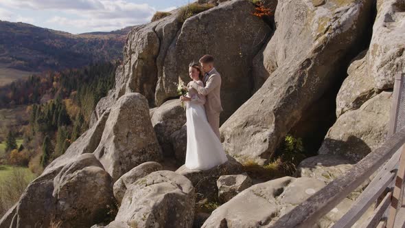 Wedding Couple in Mountain Rock