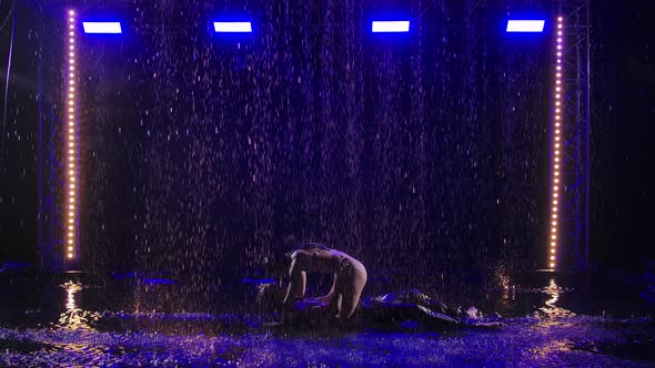 Man and Woman Performing Emotionally Touching Dance Elements of Contemporary Choreography in