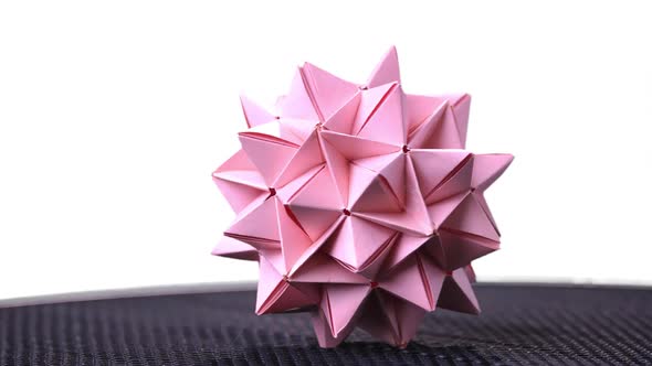 Stellated Origami Ball on White Background.