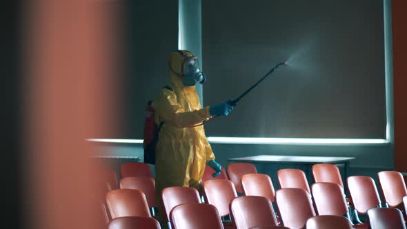 Audience Hall Is Being Chemically Disinfected By an Inspector