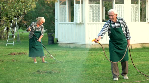 Couple Working in the Garden.