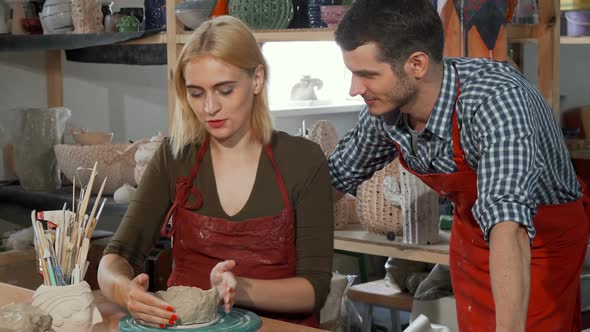 Young Couple Enjoying Working with Clay at the Pottery Workshop 1080p