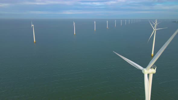 Windmill Park in the Ocean Drone Aerial View of Windmill Turbines Generating Green Energy Electric