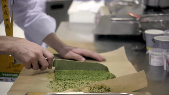 Team of Chef's Preparing Salads in Kitchen Event Contest