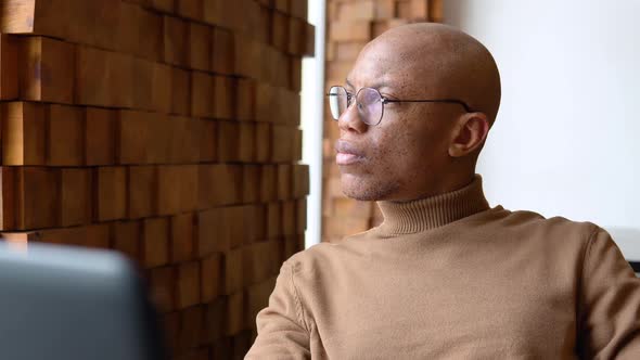 Young African Man in Camel Cashmere Sweater