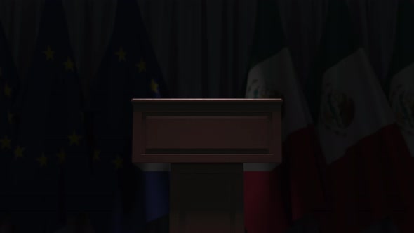 Many Flags of Mexico and the EU Behind Speaker Tribune alt