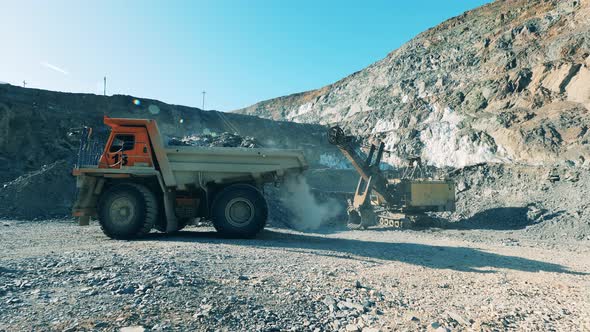 Ore Quarry with Industrial Machines Extracting It