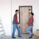 Young Happy Couple Moving in to Their New Home and They Dancing Next to Boxes - VideoHive Item for Sale