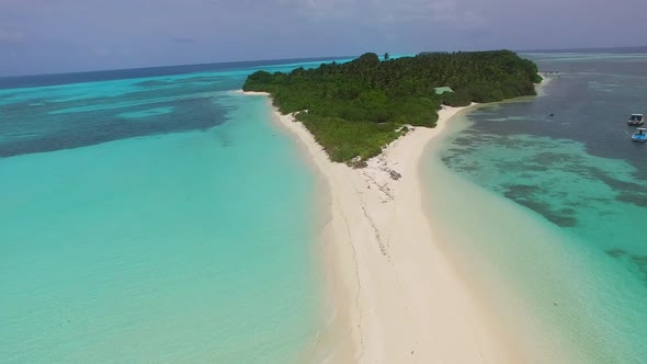 Aerial scenery of bay beach break by blue lagoon and sand background