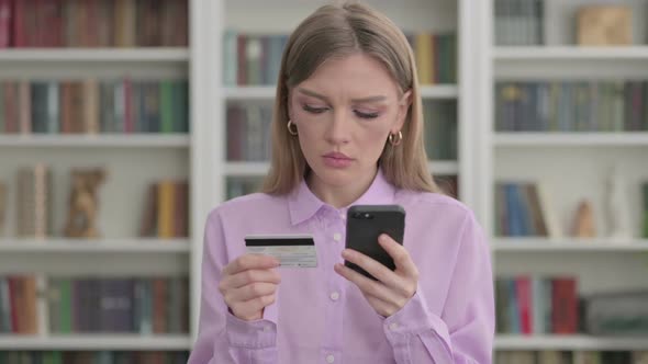 Portrait of Woman Making Online Payment Failure on Smartphone