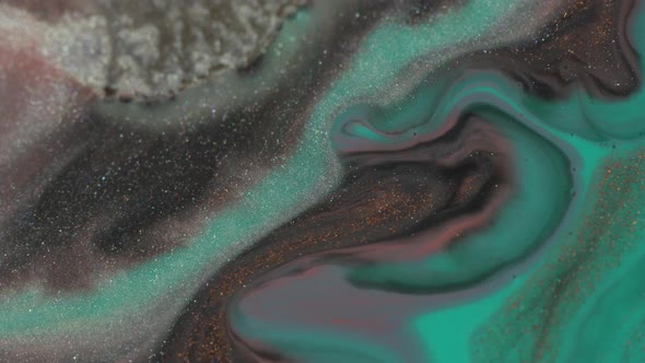Turquoise, copper, black, silver colors oil paint pouring close up. Fluid Art painting
