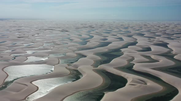 Sunset at Lencois Maranhenses Maranhao. Scenic sand dunes and rainwater lakes