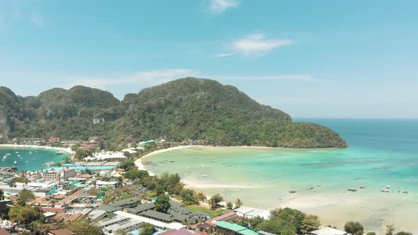 Divine Loh Dalum Beach awash with warm Andaman sea waters in Ko Phi Phi Don Island, Thailand