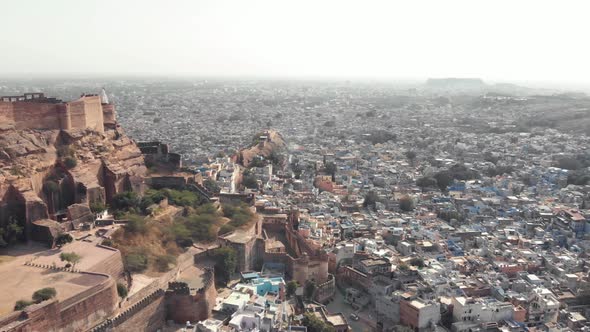 Jodhpur blue cityscape contrasting with Mehrangarh Fort in Rajasthan, India