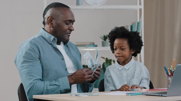 Adult African American Father Teaches to Count Little Daughter Home Schooling Mature Man Teaching